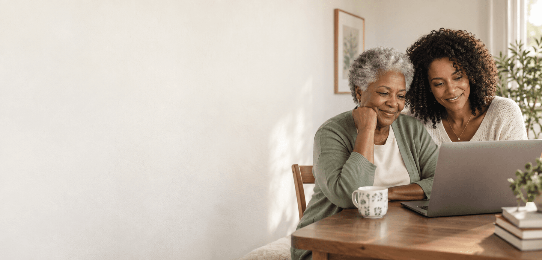 A woman and her daughter exploring health information together at home